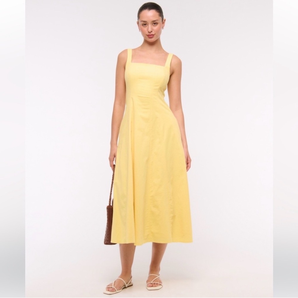 The AF Mila Stretch dress size small tall yellow